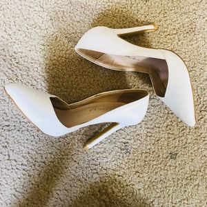 White pointed toe heels